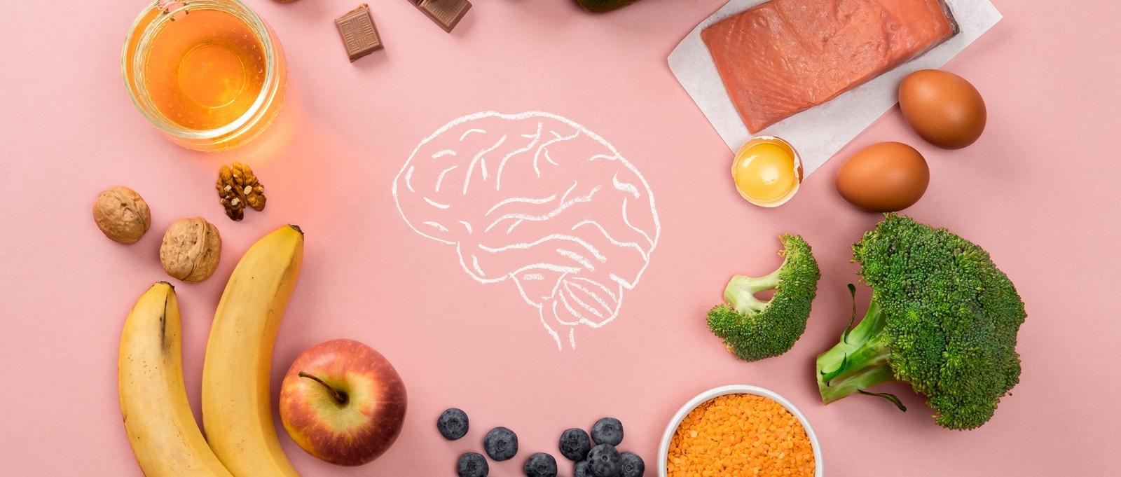 Best foods for brain and memory on pink background.